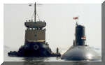 INS Sindhushastra and Tug Balram at IFR 2001. She is one of the first IN submarines which have the capability to fire missiles while submerged. The Klub-S ASCM is the weapon used for this role. Image  Mrityunjoy Mazumdar