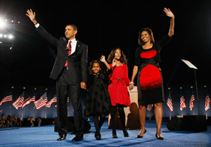 President-elect Barack Obama takes the stage with his daughters, Sasha and Malia, and wife Michelle, before speaking at a massive outdoor rally in Grant Park in Chicago on November 4, 2008.