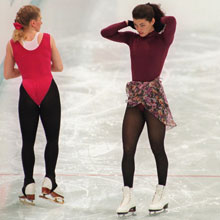 Tonya Harding, left, of the USA stands next to compatriot Nancy Kerrigan during an early morning practice session.