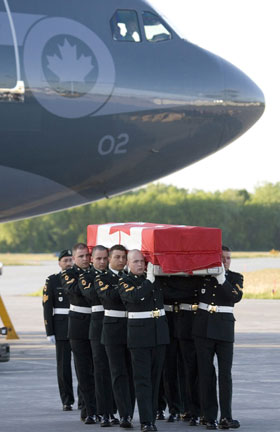 Pallbearers carry the casket of Cpl. Matthew McCully during a repatriation ceremony in Trenton, Ont., on May 28, 2007. McCully is one of more than 100 Canadian soldiers killed since the Afghan mission began in 2002.