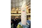 A picture dated February 7, 2011 shows Iranian President Mahmoud Ahmadinejad (L) and Defence Minister Ahmad Vahidi (R) looking at a replica capsule of Kavoshgar-4 (Explorer-4) rocket