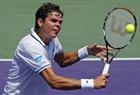 Milos Raonic of Canada hits a return during his match against Somdev Devvarman of India at the Sony Ericsson Open tennis tournament in Key Biscayne, Florida March 25, 2011.