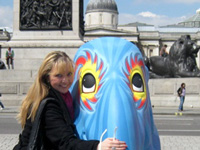 Nataliya with a sculpture in Trafalgar Square London