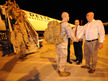 Company Commander, Captain Christopher Richardella of the United States Marines of Fox Company, 2nd Battalion, 3rd Marine Regiment is greeted by Australian MP, Warren Snowdon (R), upon arrival at the Royal Australian Air Force Base in Darwin April 4, 2012 (Reuters/Australian Department of Defence/Handout)