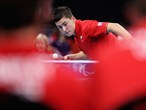 Ross Wilson of Great Britain plays a shot during the men's Team Table Tennis