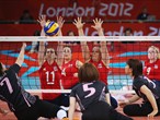 British captain Claire Harvey successfully blocks Japan in the women's Sitting Volleyball classification match