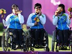 Kim Ran Sook, Ko Hee Sook and Lee Hwa Sook of the Republic of Korea celebrate Archery gold