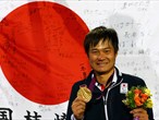Shingo Kunieda of Japan celebrates victory over Stephane Houdet of France 