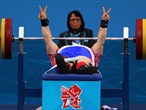 Tatiana Smirnova of Russia in powerlift victory salute