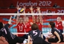 British captain Claire Harvey successfully blocks Japan in the women's Sitting Volleyball classification match