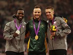  Silver medallist Blake Leeper of the United States, gold medallist Oscar Pistorius of South Africa and bronze medallist David Prince of the United States pose on the podium 