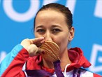 Natali Pronina of Azerbaijan kisses her gold medal