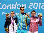 Silver medallist Daniel Sharp of New Zealand, gold medallist Oleksil Fedyna of Ukraine and bronze medallist Roman Dubovoy of Russia pose on the podium 