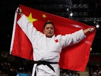 Yuan Yanping of China celebrates gold