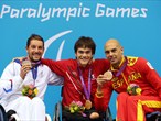  Silver medallist David Smetanine of France, gold medallist Gustavo Sanchez Martinez of Mexico and bronze medallist Richard Oribe of Spain pose on the podium 