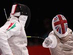David Heaton of Great Britain competes against Gyula Mato of Hungary in the Fencing 