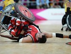 Mike Whitehead of Canada falls to the floor 