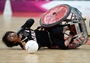 Daisuke Ikezaki of Japan falls to the floor 
