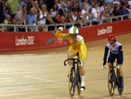 Anna Meares (L) of Australia celebrates winning the gold medal 