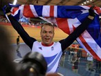 Sir Chris Hoy of Great Britain celebrates winning the gold medal in the men's Keirin Track Cycling