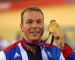 Gold medallist Sir Chris Hoy of Great Britain shows his gold medal