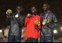 Medal winners in the men's Marathon celebrate