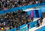 Men's 200m Backstroke medal winners pose for cameras