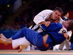 Dan Powell of Great Britain and Isao Cruz Alonso of Cuba compete in the Judo