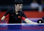 Ge Yang of China returns serve against Sebastian Powrozniak of Poland 