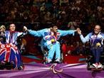 Pattaya Tadtong of Thailand ,David Smith of Great Britain and Roger Aandalen of Norway celebrate on the podium