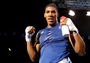 Anthony Joshua of Great Britain celebrates defeating Roberto Cammarelle of Italy