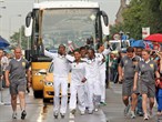 Shaquille from International Inspiration in Trinidad and Tobago runs with the Olympic Torch