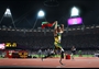 Oscar Pistorius flies the flag for South Africa after winning his second gold