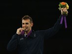 Gold medallist Carlo Molfetta of Italy salutes the crowd