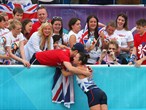 Samantha Murray of Great Britain celebrates with friends and family