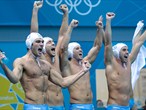 Italian players celebrate winning the Men's Water Polo semi-final match 