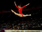 Lu Sui of China competes in the Beam final