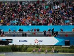 Packed stands cheer on the Geat Britain LTAMix4+ team 