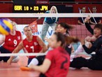 A line judge keeps a close eye on the ball as Great Britain take on Japan in women's Sitting Volleyball