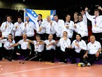 The Bosnia and Herzegovina team celebrate gold in the men's Sitting Volleyball 