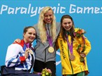 Jessica Long of the United States celebrates gold on the podium