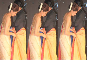 SRK learns to drape saree from Deepika