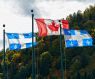 Canadian and the Quebec flags.