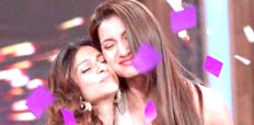 Tanishaa and winner Gauahar Khan share a hug at the 'Bigg Boss 7' Grand Finale