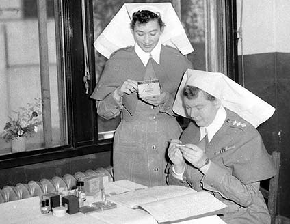 Photo of the two nurses at work at the hospital at Kure