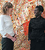 RSA head of arts, Michaela Crimmin, and architect, Elsie Owusu, stand in front of Sasa by El Anatsui