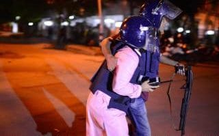 Bangladeshi police take cover during the 2016 siege 