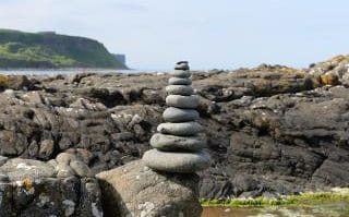 Stone stacking row as environmentalist say 'epidemic' is ruining scenery - but fans say it boosts mental health (stock image)